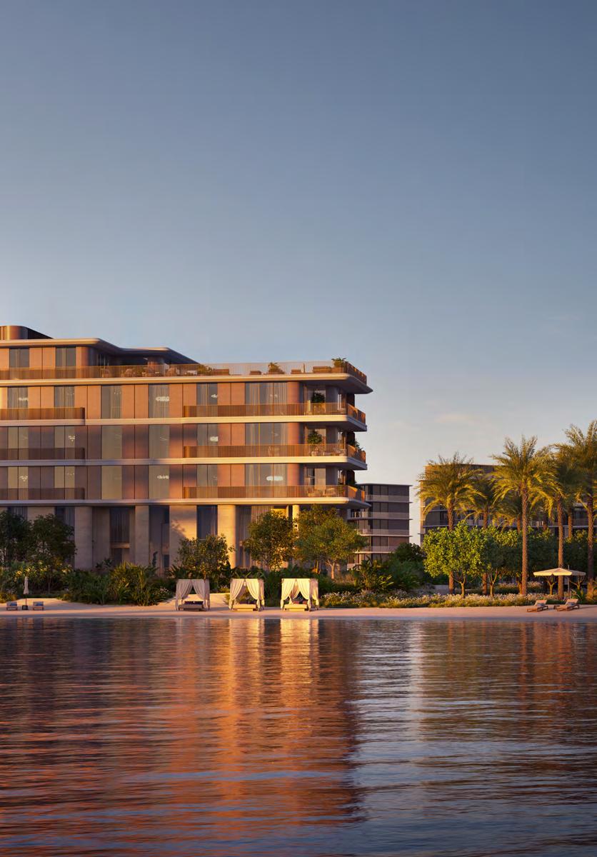 Palm Central facade reflected on the water at dusk
